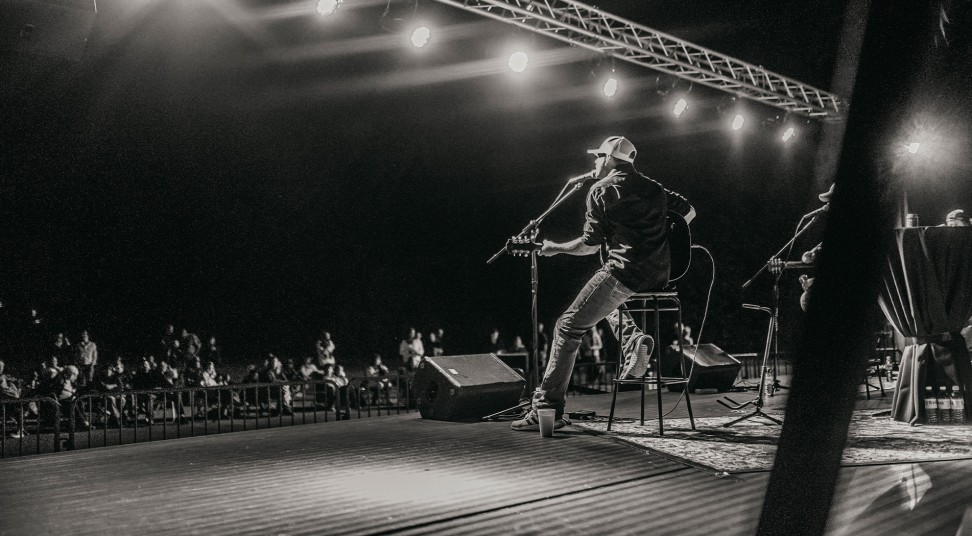 performer on stage at concert